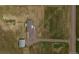 Aerial shot of a home, outbuilding, and property, showcasing the layout at 4255 S County Road 185, Byers, CO 80103