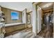 Modern bathroom features soaking tub, walk-in shower, and access to closet with safe at 4255 S County Road 185, Byers, CO 80103