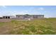 Beautifully renovated house featuring a well-manicured lawn, a garage, and a spacious front yard at 4255 S County Road 185, Byers, CO 80103