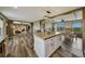 Spacious kitchen with island, open to the dining and living area, perfect for entertaining and gatherings at 4255 S County Road 185, Byers, CO 80103