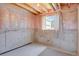 Unfinished basement with exposed beams and concrete walls offers customization and expansion potential at 3596 Longs Peak Cir, Parker, CO 80138
