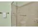 Clean bathroom with a shower, towel bar, and toilet at 3596 Longs Peak Cir, Parker, CO 80138
