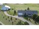 Beautiful single-story home with an attached garage and a long driveway on a sprawling lot with barn at 3596 Longs Peak Cir, Parker, CO 80138