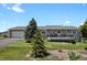 Charming single-story home with a spacious front yard and a lovely wood deck at 3596 Longs Peak Cir, Parker, CO 80138