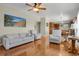Cozy living room with comfortable seating and a bright, open floor plan at 3596 Longs Peak Cir, Parker, CO 80138