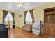 Home office space featuring hardwood floors and plenty of natural light at 3596 Longs Peak Cir, Parker, CO 80138