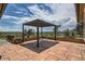 Spacious outdoor patio with a pergola and scenic views of the surrounding landscape at 14030 E Progress Way, Aurora, CO 80015
