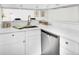 Modern kitchen boasting stainless steel appliances, quartz countertops, and ample cabinet space at 1629 N Clarkson St # 23, Denver, CO 80218