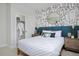 Inviting bedroom with a comfortable bed, decorative pillows, and a walk-in closet at 10866 Lyric St, Lone Tree, CO 80134