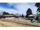 Neighborhood playground with swings and slides, complemented by picnic tables for Gathering fun at 9017 E Oxford Dr, Denver, CO 80237