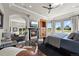 Spacious main bedroom features a fireplace, sitting area, built ins and scenic windows at 1287 Buffalo Ridge Rd, Castle Pines, CO 80108