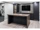 Finished basement has bar and workout areas for modern living at 3439 Uinta St, Denver, CO 80238
