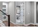 Hallway view of open office space with frosted glass doors, neutral paint and white trim at 3439 Uinta St, Denver, CO 80238