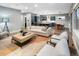 Open concept living area with stylish furniture, modern decor, and bright natural light at 3439 Uinta St, Denver, CO 80238