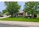 A charming single-Gathering home with a well-manicured lawn and inviting front porch at 3144 Stevens N Cir, Erie, CO 80516