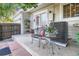 Cozy back patio with seating and plants, perfect for relaxing and enjoying the outdoor space at 19725 Rosewood Ct, Parker, CO 80138