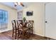 Cozy dining area features a glass-top table with seating for four, perfect for intimate meals at 19725 Rosewood Ct, Parker, CO 80138