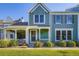 Charming two-story home with a covered porch and beautifully landscaped front yard at 19725 Rosewood Ct, Parker, CO 80138