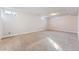 Spacious basement with neutral carpeting and ample light at 10502 Washington Way, Northglenn, CO 80233