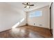 Simple bedroom with hardwood floors and a window at 10502 Washington Way, Northglenn, CO 80233