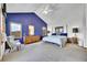 Serene main bedroom features a vaulted ceiling, plush carpet, and a large window with great outdoor views at 3794 N State Highway 67, Sedalia, CO 80135