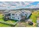 Exterior of the home showing multi-level decks, fenced yard and mature landscaping at 3794 N State Highway 67, Sedalia, CO 80135
