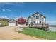 Beautiful home featuring a large deck, garage, and well-maintained landscaping at 3794 N State Highway 67, Sedalia, CO 80135