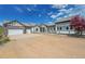 Charming home featuring stone accents, inviting curb appeal, and a spacious driveway at 3794 N State Highway 67, Sedalia, CO 80135