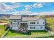 Exterior of home with multilevel decks, fenced yard, tudor style trim with mountain views at 3794 N State Highway 67, Sedalia, CO 80135
