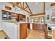 Updated kitchen with dark cabinetry, stainless steel appliances, and ample counter space at 3794 N State Highway 67, Sedalia, CO 80135