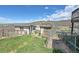 Exterior view of an outdoor storage shed with surrounding green grass at 3794 N State Highway 67, Sedalia, CO 80135