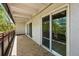 Balcony with tile flooring and red railings offers an outdoor living space at 1441 N Humboldt St # 204, Denver, CO 80218