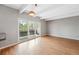 Open-concept living space with balcony access, combining indoor comfort with outdoor views and natural light at 1441 N Humboldt St # 204, Denver, CO 80218