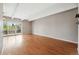 Spacious living room with sliding glass doors to a balcony, providing natural light and an airy feel at 1441 N Humboldt St # 204, Denver, CO 80218