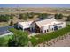 Exterior view of the modern community center with attractive landscaping and parking at 3351 N Buchanan Way, Aurora, CO 80019