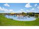 Colorful community playground with various play structures for enjoyment at 2360 E 121St Ave, Thornton, CO 80241