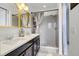 Elegant bathroom with double vanity, stylish shower, and modern fixtures at 9667 Walden St, Commerce City, CO 80022