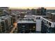 Stunning city views include rooftop pool and patio amenities on top of buildings at 1750 Wewatta St # 830, Denver, CO 80202