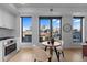 Bright kitchen with stainless appliances, light wood floors and a fantastic view of the city at 1750 Wewatta St # 830, Denver, CO 80202