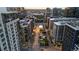 Excellent aerial view of a modern city street with businesses and apartment buildings at 1750 Wewatta St # 830, Denver, CO 80202