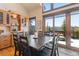Bright dining area with mountain views and built-in cabinetry at 85 Uncle Sam Lode, Breckenridge, CO 80424