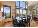 Inviting dining area featuring hardwood floors, mountain views, and a large window at 85 Uncle Sam Lode, Breckenridge, CO 80424