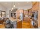 Beautiful open kitchen with stone countertops, stainless steel appliances, and a breakfast bar at 85 Uncle Sam Lode, Breckenridge, CO 80424