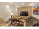 Cozy living room with a brick accent wall, plush seating, and stylish decor at 85 Uncle Sam Lode, Breckenridge, CO 80424