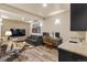 Comfortable living area with modern decor, a large TV, and a convenient kitchenette at 85 Uncle Sam Lode, Breckenridge, CO 80424
