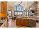 Open concept living space with fireplace, kitchen, dining, and mountain views at 85 Uncle Sam Lode, Breckenridge, CO 80424