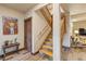Beautiful staircase with wood and stone accents, leading to additional living spaces at 85 Uncle Sam Lode, Breckenridge, CO 80424