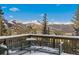 Picturesque winter mountain views from deck with seating area at 85 Uncle Sam Lode, Breckenridge, CO 80424