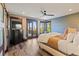 Inviting bedroom featuring a private balcony, natural light, and a calming color palette at 85 Uncle Sam Lode, Breckenridge, CO 80424