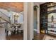 Elegant dining room features a decorative copper ceiling and built-in wine storage at 19429 W 88Th Dr, Arvada, CO 80007
